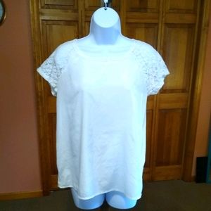 Small white blouse with lace sleeves